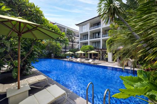 Bazén v ubytování Taksu Sanur Hotel nebo v jeho okolí