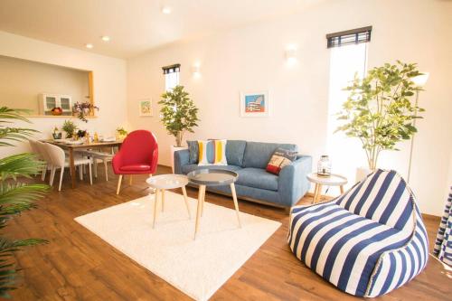 Posezení v ubytování 沖縄屈指のリゾートエリア恩納村の1棟貸し切り別荘へめんそーれ