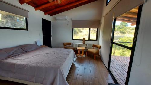 Postel nebo postele na pokoji v ubytování Mansavista Cabañas