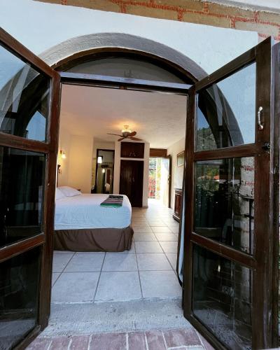 Katil atau katil-katil dalam bilik di Hotel Hacienda Ventana del Cielo
