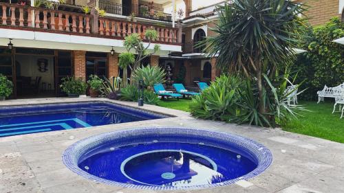 Kolam renang di atau dekat dengan Hotel Hacienda Ventana del Cielo