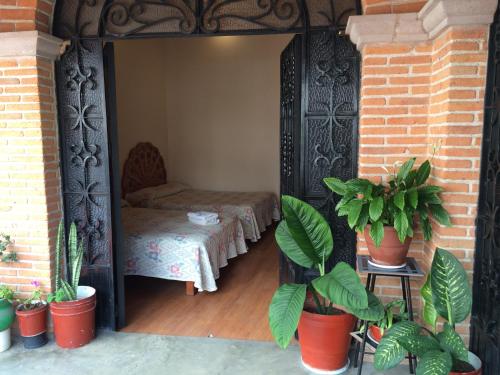 Een bed of bedden in een kamer bij Hotel Estelar