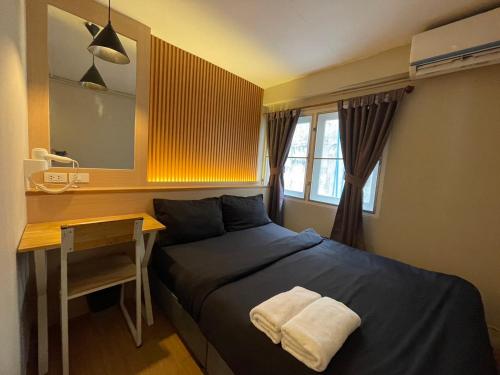 Postel nebo postele na pokoji v ubytování Mind Day Hostel Khaosan