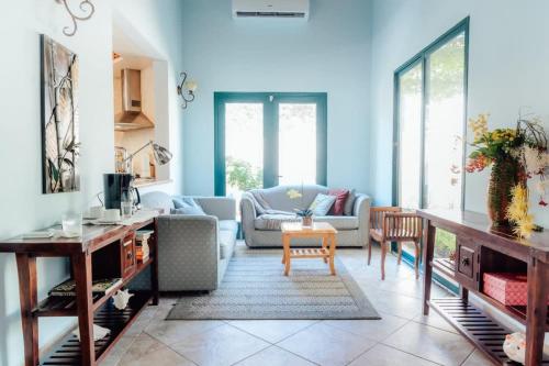 Posezení v ubytování The elegance of Tierra del Sol with private pool