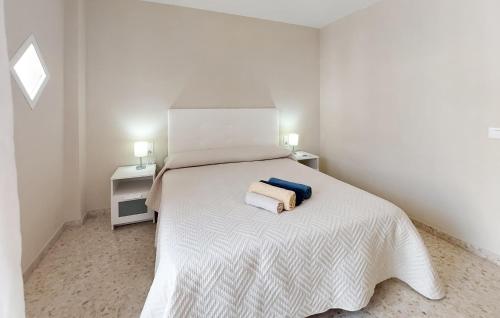 Ένα ή περισσότερα κρεβάτια σε δωμάτιο στο 2 Bedroom Nice Home In Chipiona