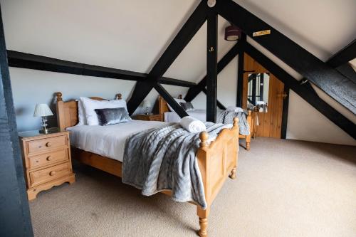 Ένα ή περισσότερα κρεβάτια σε δωμάτιο στο Treworgie Barton - Duchy