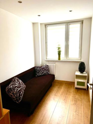 Χώρος καθιστικού στο Apartament dla Ciebie