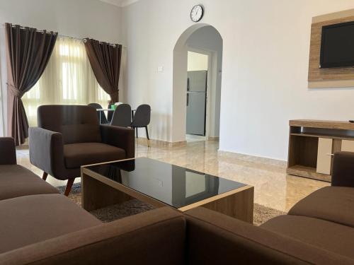 Χώρος καθιστικού στο Fins Guest House