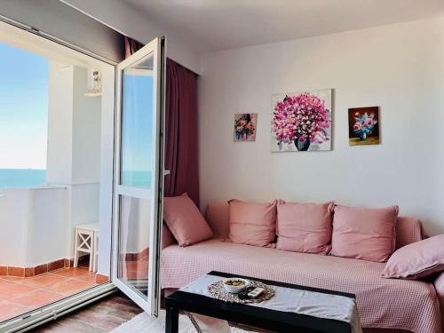 Zona de estar de Little Sicily Seafront Apartment