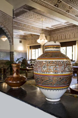 a large vase sitting on a counter in a room at Villa Quieta in Essaouira