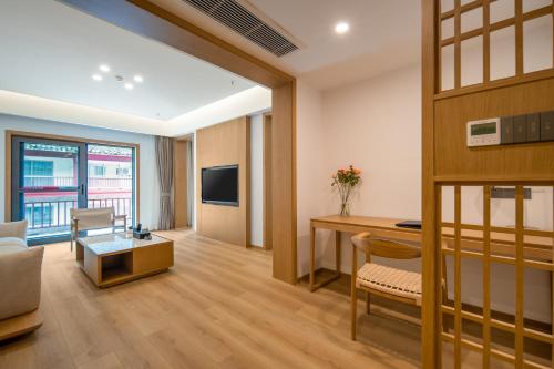 Hunan New Pipaxi Hotelにあるテレビまたはエンターテインメントセンター
