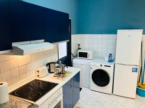 Kuchyň nebo kuchyňský kout v ubytování Apartment Lugo Rooms