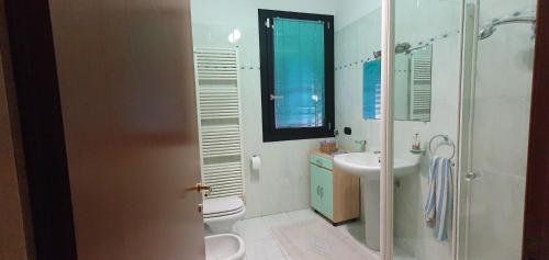 Kylpyhuone majoituspaikassa MGC