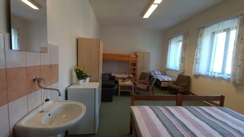 Postel nebo postele na pokoji v ubytování Prázdninový dům Sloup - Sloup v Čechách