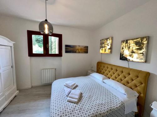 Postel nebo postele na pokoji v ubytování Appartamento al Castello
