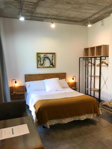 a bedroom with a large bed in a room at Urban House Siurot 33 in Seville
