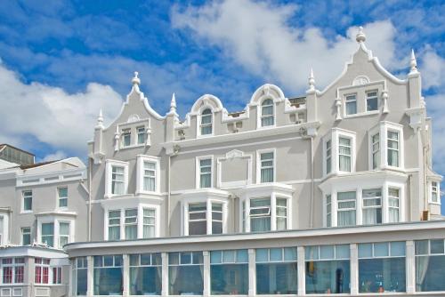 a large white building with a lot of windows at Best Western Carlton Hotel in Blackpool