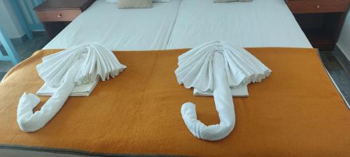 Cama o camas de una habitación en Maria's Hotel