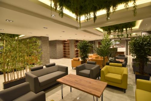 Green Palace Suite Hotelにあるシーティングエリア
