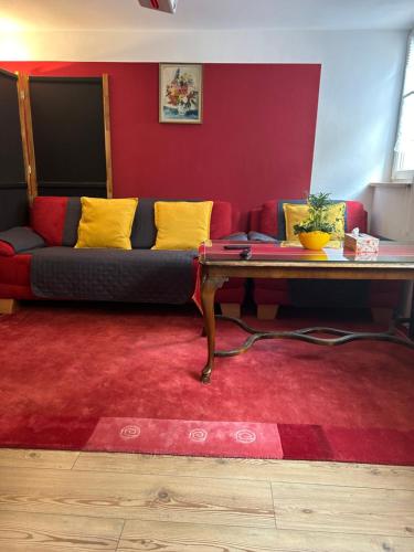 a living room with a couch and a table at Homestay in Waldshut-Tiengen