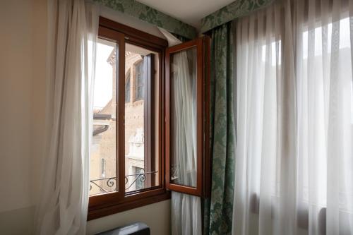 Gambar di galeri bagi Duomo Boutique Hotel di Chioggia
