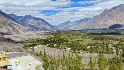 an aerial view of a valley in the mountains at Royal Deluxe Camp & Resort, Hunder- Nubra in Nubra