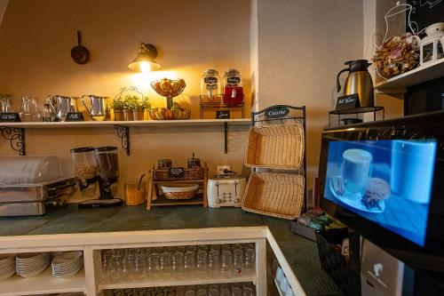 Kuchyň nebo kuchyňský kout v ubytování Hotel Casa Wagner