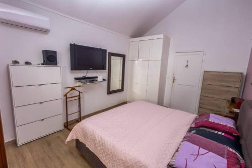 Postel nebo postele na pokoji v ubytování Villa Charm' Île