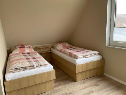 Postel nebo postele na pokoji v ubytování Ferienappartements Menssen