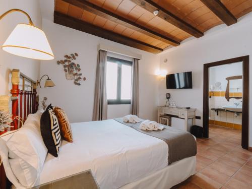 Postel nebo postele na pokoji v ubytování Hotel Boutique Cerro del Sol Adults only recommended
