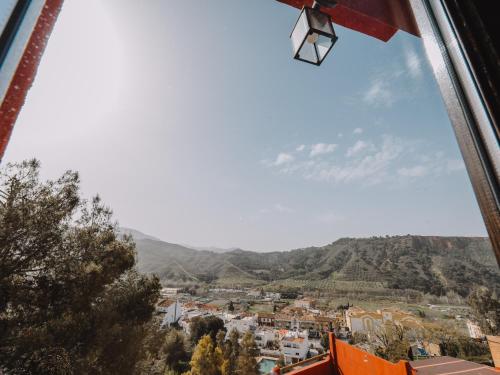 a view from a window of a city at Hotel Boutique Cerro del Sol Adults only recommended in Granada