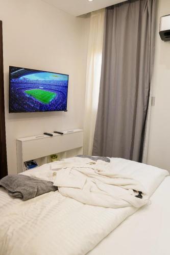 Postel nebo postele na pokoji v ubytování مدينه 15مايو