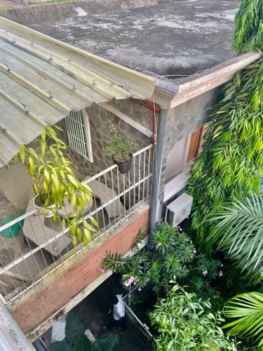 an overhead view of a balcony with plants on it at Résidence ARCHANGE in Pointe-Noire