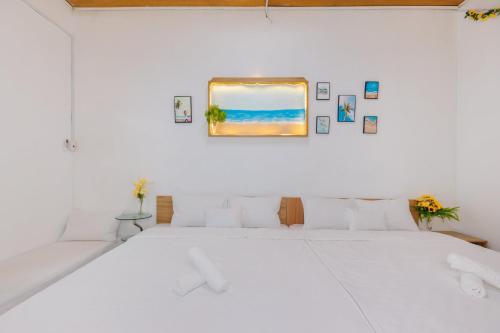 Ένα ή περισσότερα κρεβάτια σε δωμάτιο στο Homestay Biển Xanh