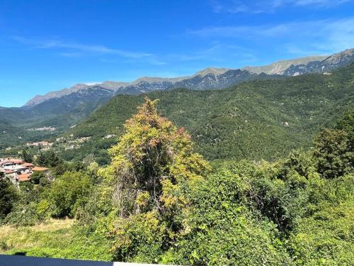 a view of a valley with mountains in the background at Casa Berton in Mochignano