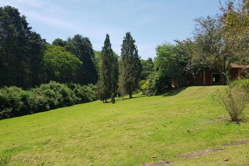 Jardín al aire libre en Chácara dos Sonhos com Piscina e Hidromassagem