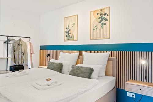 Llit o llits en una habitació de Greenhouse Living Küstelberg Apartments - 5 Betten & 2 Schlafsofas - 7 Minuten von Winterberg für 9 Personen