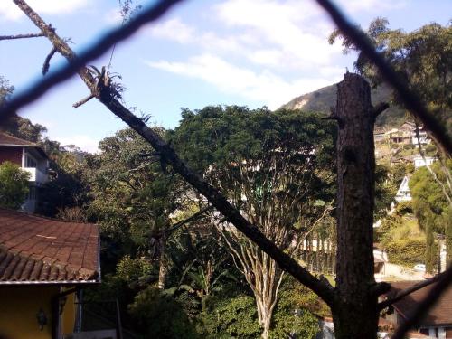 a view of a mountain from a house at Serra Verde Imperial ! APT com Suíte, Quitandinha - vista para o Verde !! in Petrópolis