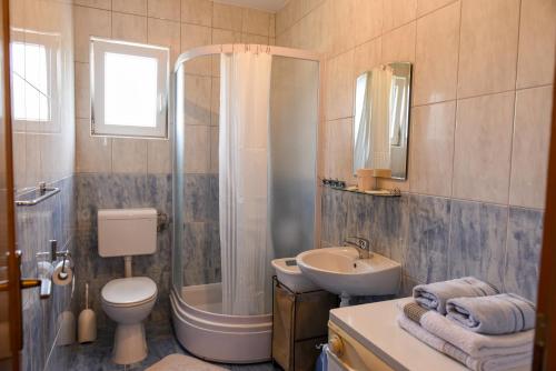 Koupelna v ubytování Apartments and rooms Mara i Pavo Medjugorje
