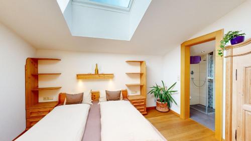 Postel nebo postele na pokoji v ubytování Appartements Hofer