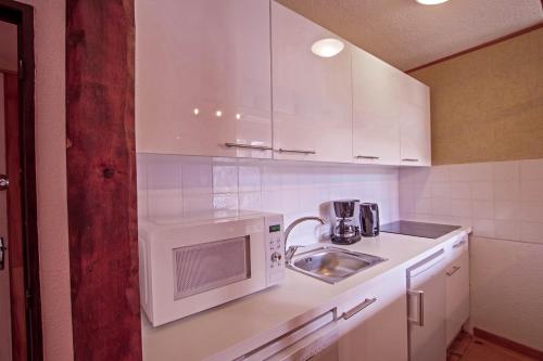 Kuchyň nebo kuchyňský kout v ubytování APPARTEMENT ISARD
