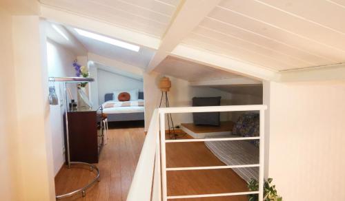 a room with a bunk bed and a bedroom at Donna Rosa - Main Avenue in Taormina