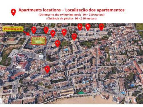 a map of a city with red pointers at Luz Ocean Club Apartments in Luz