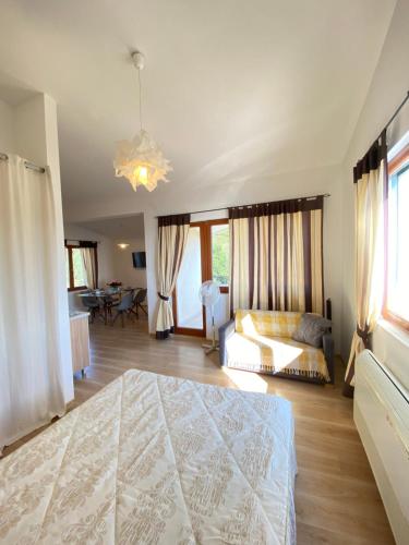 Postel nebo postele na pokoji v ubytování Villa Inna