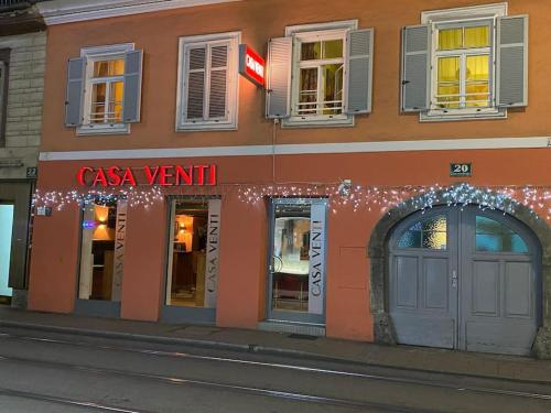 a building with a sign on the side of it at CasaVenti T6 in Graz
