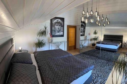 מיטה או מיטות בחדר ב-Haus Schmidhuber Wohnung 4