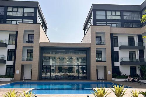 Πισίνα στο ή κοντά στο Comffy Cozzy Studio - Embassy Gardens