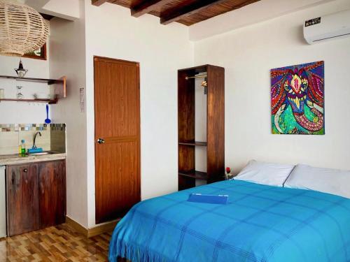 Un pat sau paturi într-o cameră la Suite frente al mar - MAR