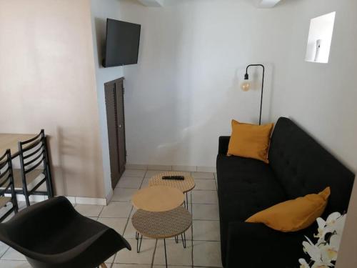 Χώρος καθιστικού στο Maisonette avec jardinet sur le bas du Faron