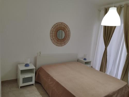 Postel nebo postele na pokoji v ubytování IL BORGO ANTICO - TORRE A MARE